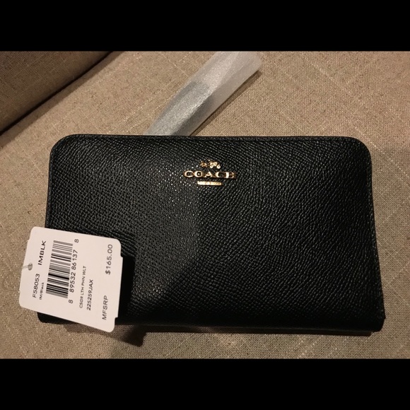 Coach Handbags - ONE HOUR SALE NWT Coach WRISTLET